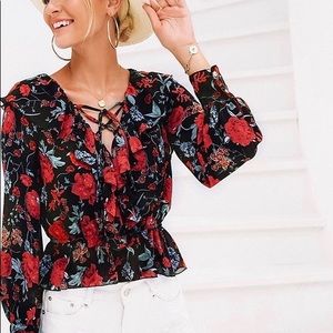 red roses black blouse with ruffles